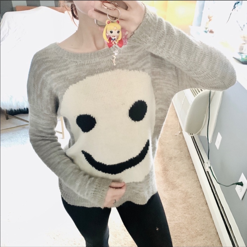 Garage smiley face gray sweater